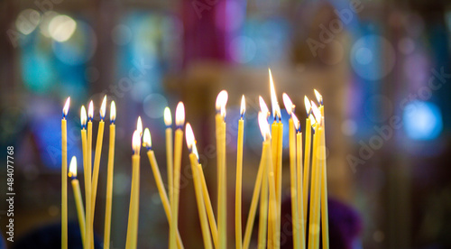 wax candles in the interior of the church