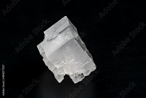 Crystals of potassium chloride on a black background photo