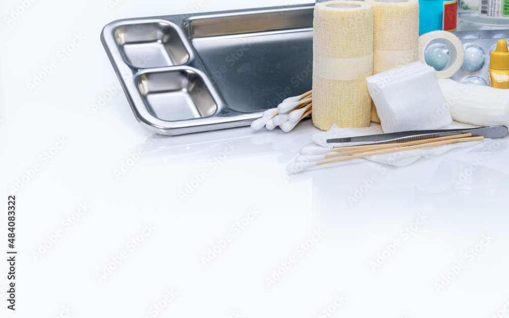 Wound care dressing set. Wound care equipment in hospital for nurse. Conform bandage, forceps, alcohol, cotton sticks, povidone-iodine for infection wound. Medical supply. Medical equipment for nurse. Wound care dressing set. Wound care equipment in hospital for nurse. Conform bandage, forceps, alcohol, cotton sticks, povidone-iodine for infection wound. Medical supply. Medical equipment for nurse.