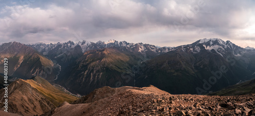 Panoramic view of mountain range of the Caucasus Mountains. View from the top of the mountain. Elbrus region