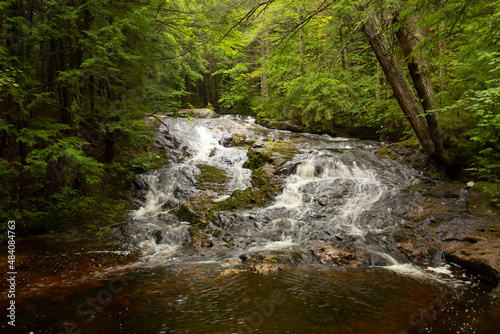 Kidder Falls in the woods of Sunapee, New Hampshire. photo