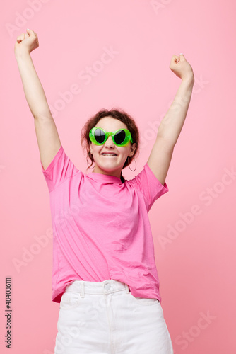 Young woman with green glasses decoration gesture with his hands Lifestyle