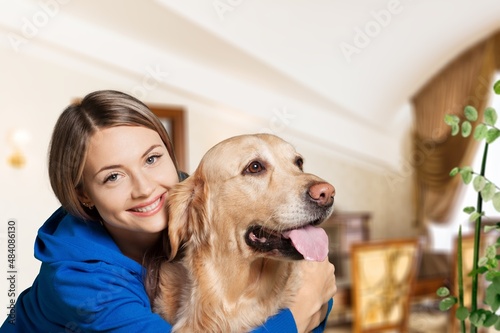 Wallpaper Mural Happy young woman in casual outfit with playful dog, pet and owner Torontodigital.ca