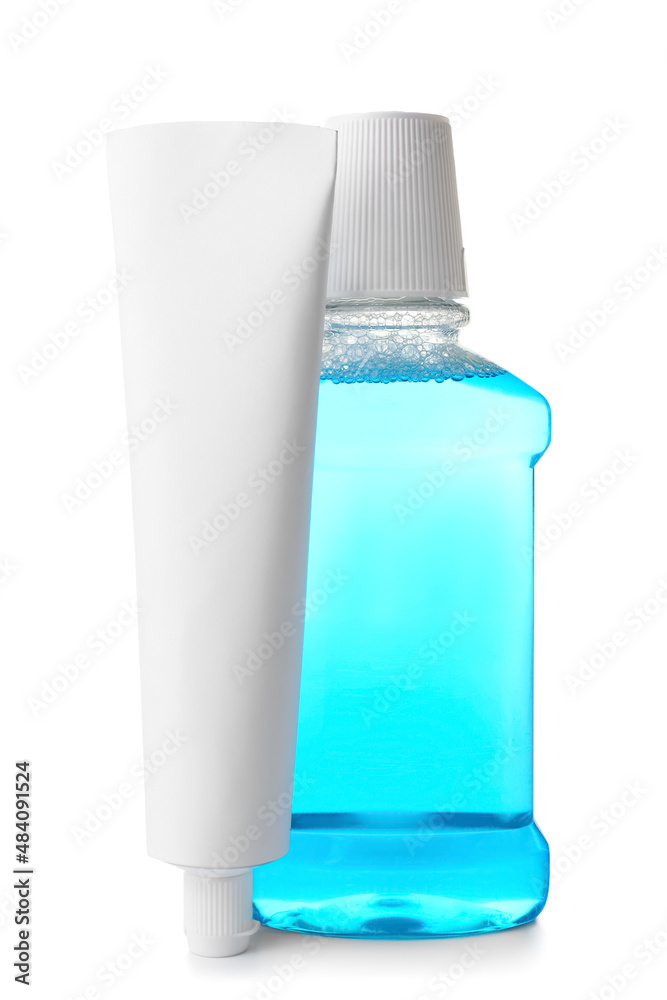 Tooth paste and mouthwash on white background Tooth paste and mouthwash on white background