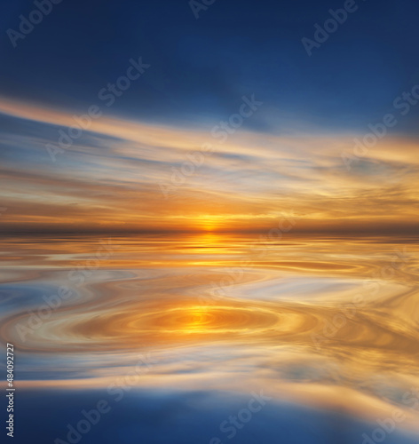 Sunlight reflected on calm  smooth water