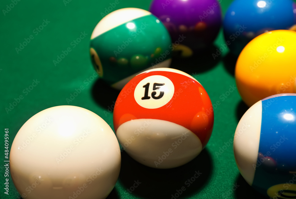 Different billiard balls on green table Different billiard balls on green table