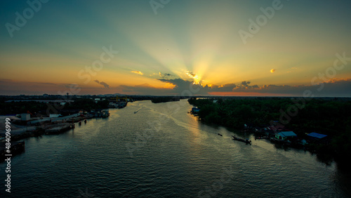 Panoramic nature background  mountains  sea  trees  twilight lights in the sky  waterfront communities   naturally blurred through the wind  seen on tourist spots or scenic spots