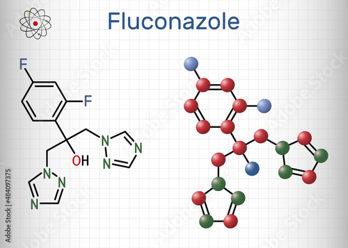 Fluconazole, molecule. It is triazole antifungal medication used to treat fungal infections, candidiasis. Structural chemical formula, molecule model. Sheet of paper in a cage photo