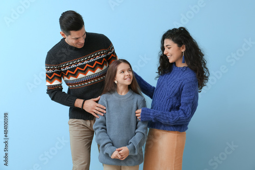 Little girl and her parents...