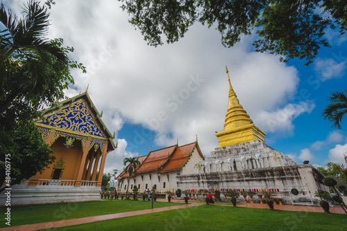 The golden stupa at Wat Phra That Chang Kham Worawihan or Phrathat Chang Kham Worawihan temple is the one attraction and has famous of Nan province, Thailand