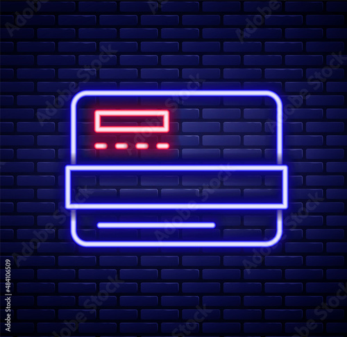 Glowing neon line Credit card icon isolated on brick wall background. Online payment. Cash withdrawal. Financial operations. Shopping sign. Colorful outline concept. Vector