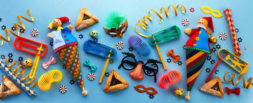 Purim, jewish carnival holiday celebration background. Top view, flat lay