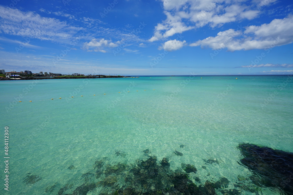charming seascape: clear emerald sea and blue sky