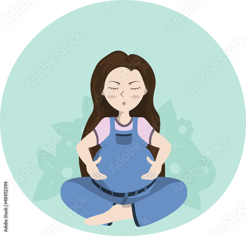 Pregnant woman meditating in the lotus position on the abstract background with flowers and leaves 