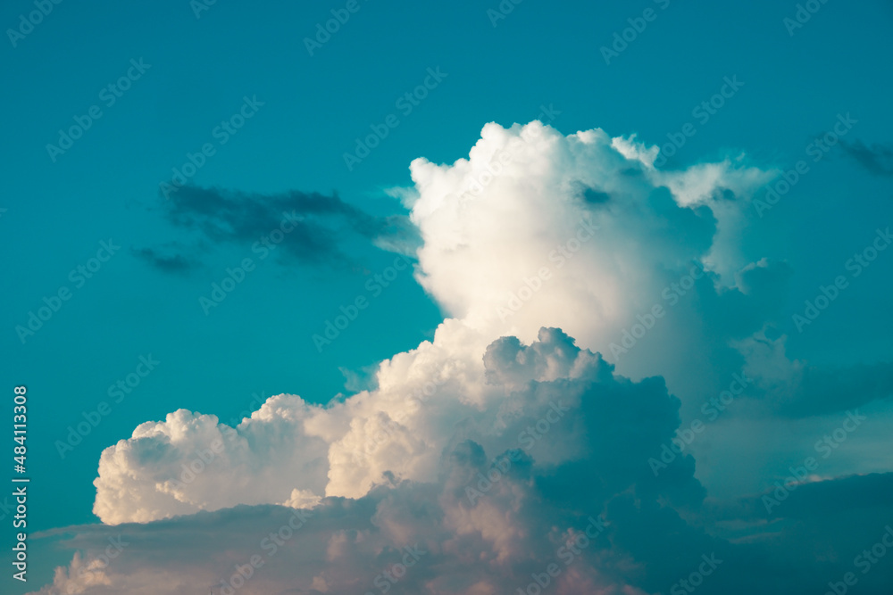 Huge white fluffys clouds sky background with blue sky background
Huge white fluffys clouds sky background with blue sky background