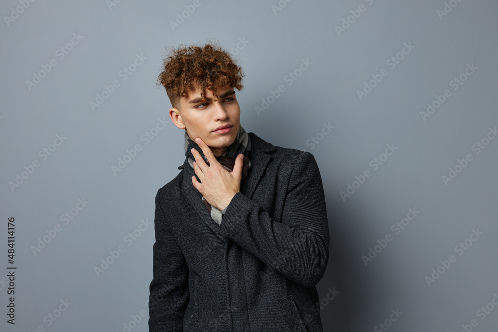 handsome guy Black coat posing fashion Lifestyle unaltered handsome guy Black coat posing fashion Lifestyle unaltered
