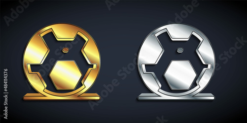 Gold and silver Soccer football ball icon isolated on black background. Sport equipment. Long shadow style. Vector