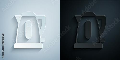 Paper cut Electric kettle icon isolated on grey and black background. Teapot icon. Paper art style. Vector