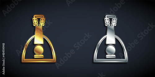 Gold and silver Musical instrument balalaika icon isolated on black background. Long shadow style. Vector