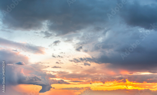 Beautiful clouds in the sky. Colorful sunset or dawn. landscape with sunbeams