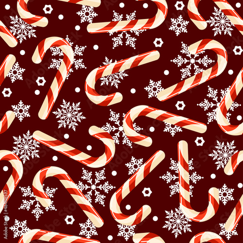 Seamless caramel cane background. Christmas candy on a dark brown background with white snowflakes. Vector illustration isolated for design and web.