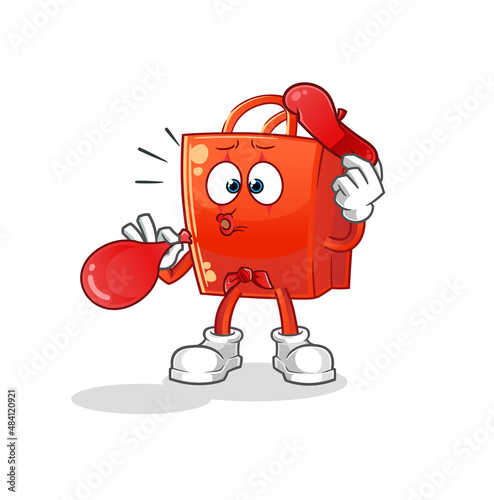 shopping bag pantomime blowing balloon. cartoon mascot vector