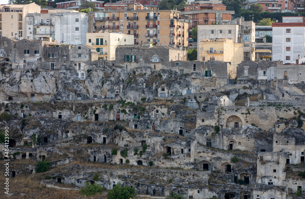 Panoramic view of Sassi di Matera a historic district in the city of Matera, well-known for their ancient cave dwellings from the Belvedere di Murgia Timone,  Basilicata, Italy