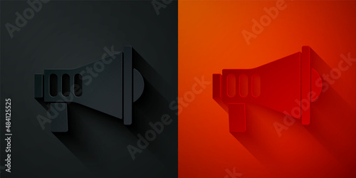 Paper cut Megaphone icon isolated on black and red background. Speaker sign. Paper art style. Vector