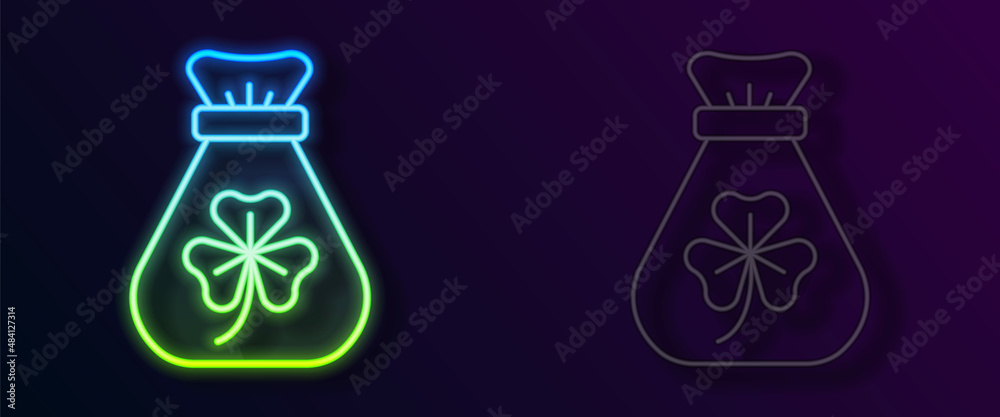 Glowing neon line Money bag with clover trefoil leaf icon isolated on black background. Happy Saint Patricks day. National Irish holiday. Vector