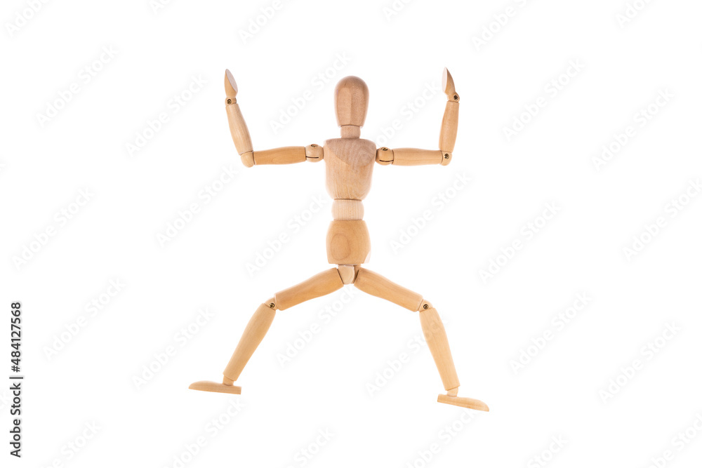 wooden man in a jump spread his arms isolated on a white background. Stretch concept wooden man in a jump spread his arms isolated on a white background. Stretch concept