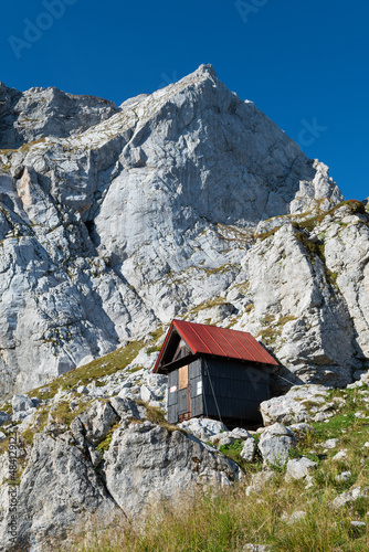 Bivouac shelter Nogara under mount Mangart in Julian Alps on Italian-Slovenian border