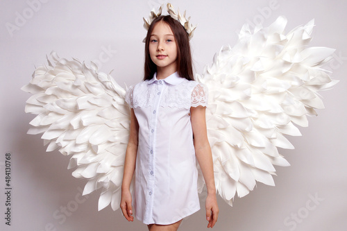 Pretty young lady with angel wings