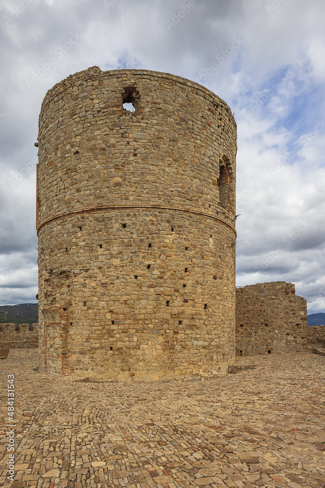 Naklejka premium Close up of a watchtower in the castle of Jimena de la Frontera situated on the outskirts of the village
