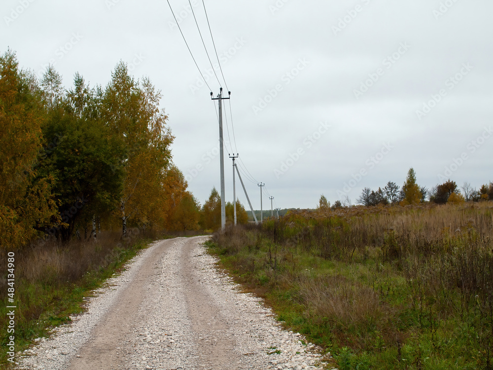 a rural road of gravel on a cloudy day
