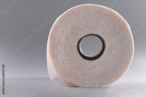 White roll of soft toilet paper, clean tissue for personal hygiene photo