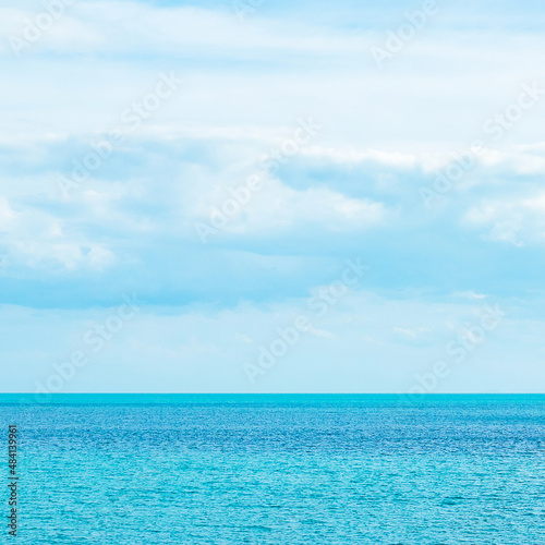 beautiful ocean and blue sky background. Relaxing, summer, travel, holiday and vacation concept