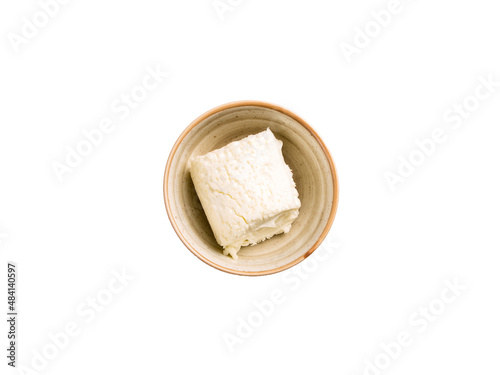 Clotted cream (butter cream) for Turkish breakfast .Kaymak in bowl on the white background.