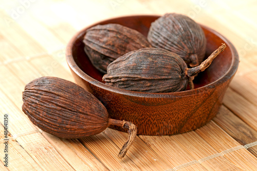 Black cardamom on a white background  photo