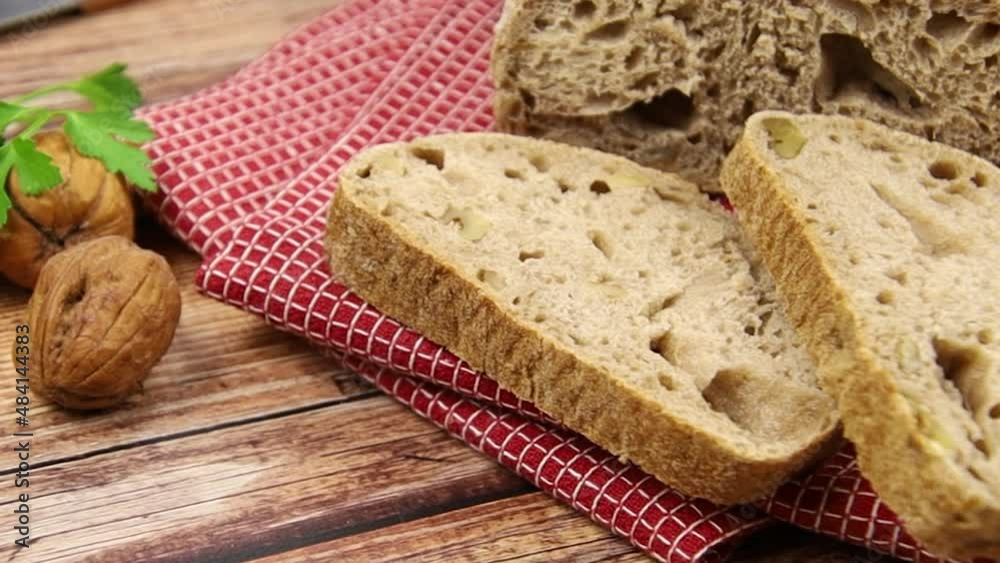 nut bread sliced on a wooden board nut bread sliced on a wooden board