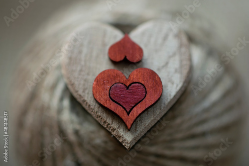 wooden hearts on a ball of yarn