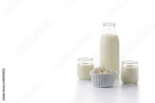 Milk kefir drink isolated on white background. Liquid and fermented milk product isolated on white background photo