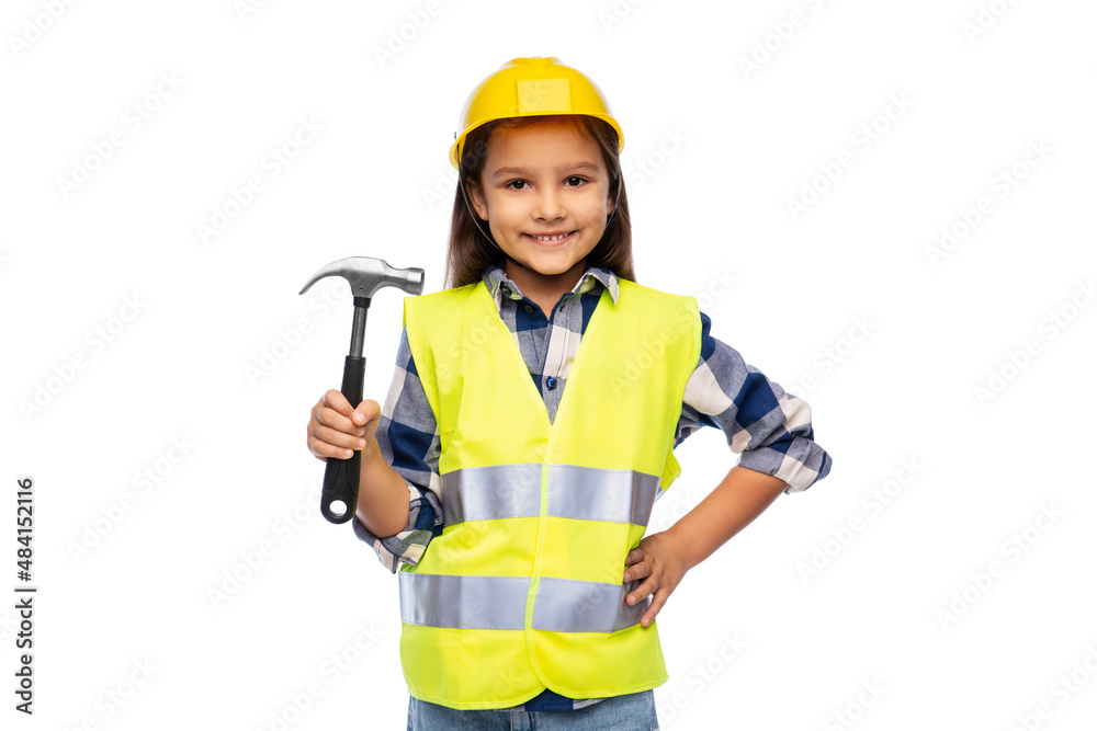 building, construction and profession concept - smiling little girl in protective helmet and safety vest with hammer over white background building, construction and profession concept - smiling little girl in protective helmet and safety vest with hammer over white background