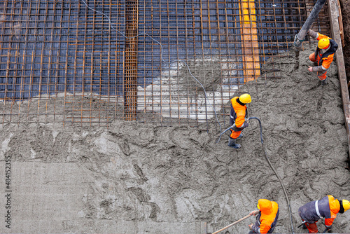 Concrete pouring on the construction site.