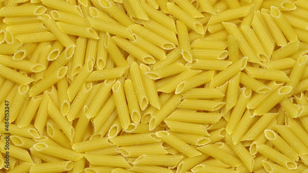 Pasta (macaroni) background rotation. Close up Pasta (macaroni) background rotation. Close up