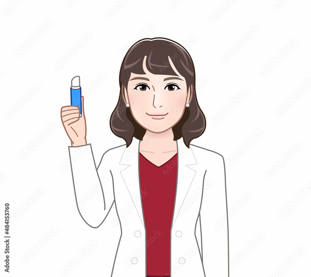 リップクリームを持った女性