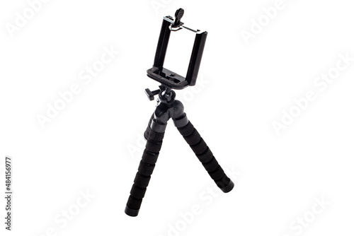 Black tripod for mounting and shooting with a smartphone. Isolation on white.