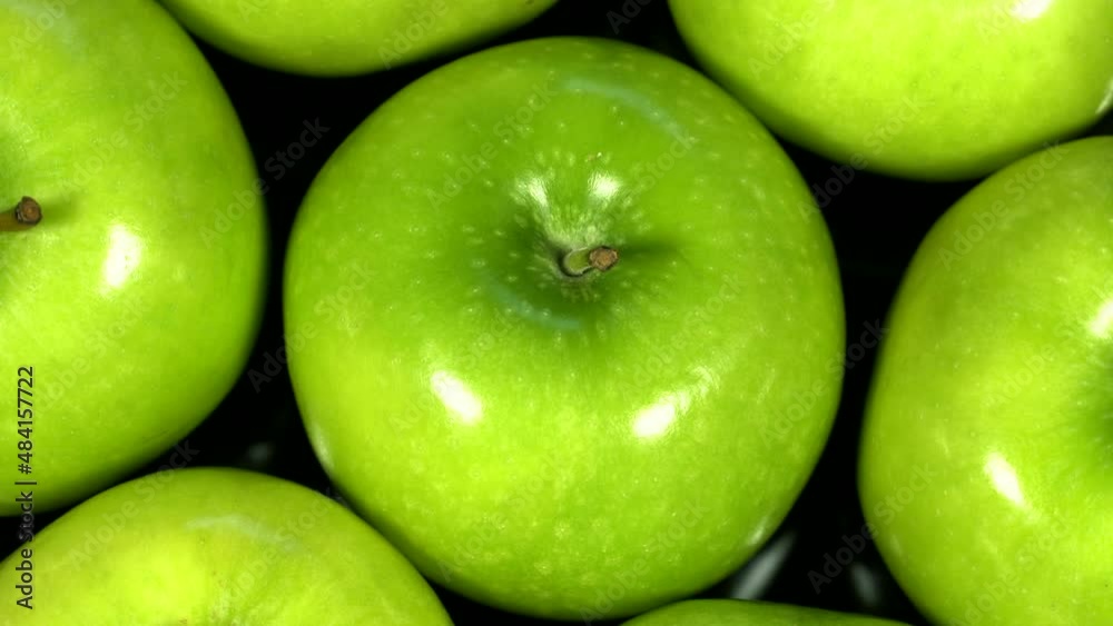 Fresh ripe green apples rotation background. Loop motion Fresh ripe green apples rotation background. Loop motion