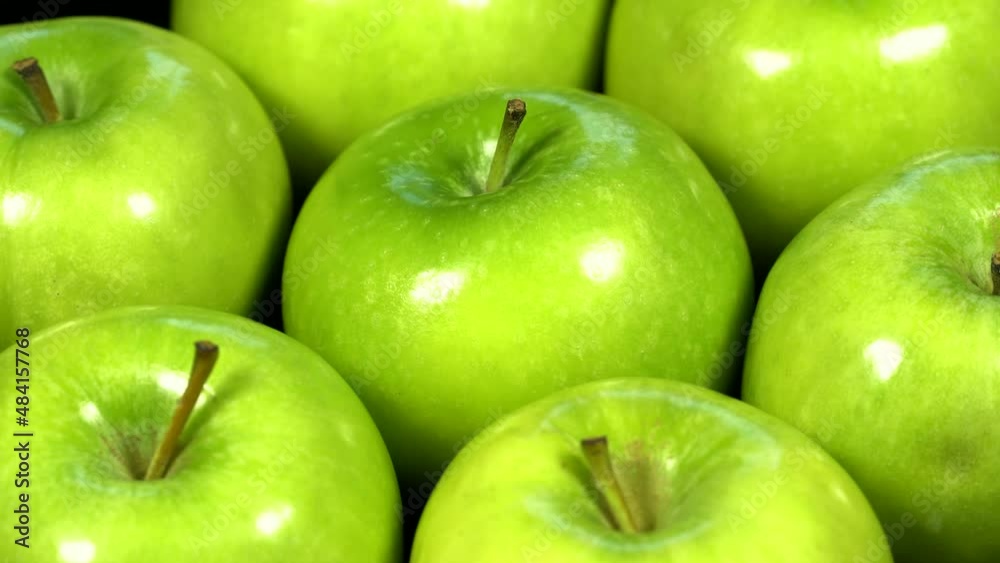 Fresh ripe green apples rotation background. Loop motion Fresh ripe green apples rotation background. Loop motion