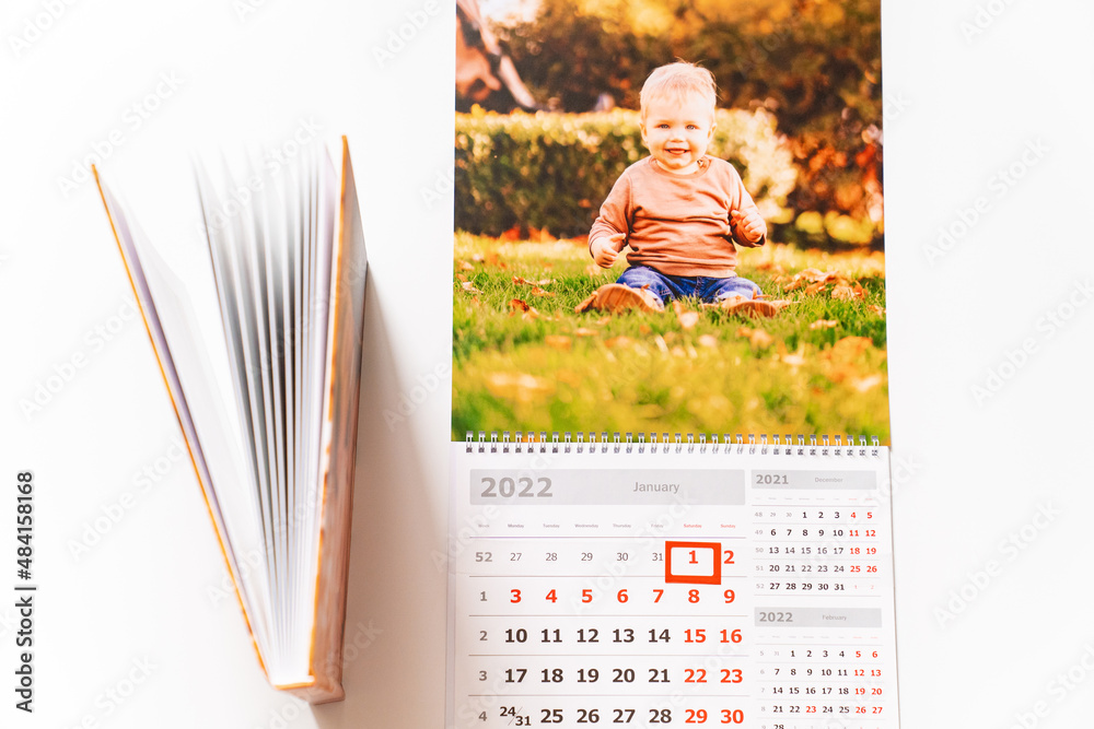 calendar for 2022 with a photo of boy and photobook from a photo shoot ...