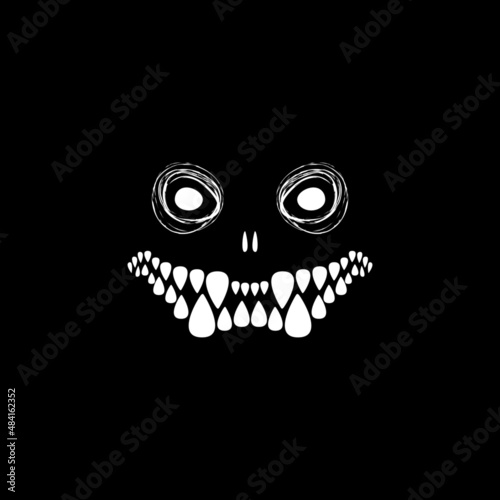 Halloween. The face of the monster on a black background. 